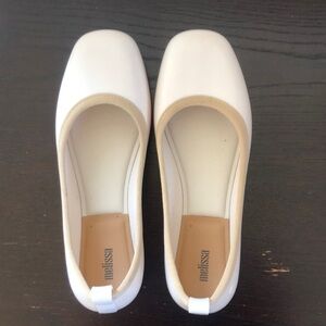 Melissa pvc sandal. Cream with tan trim. Never worn.size 10